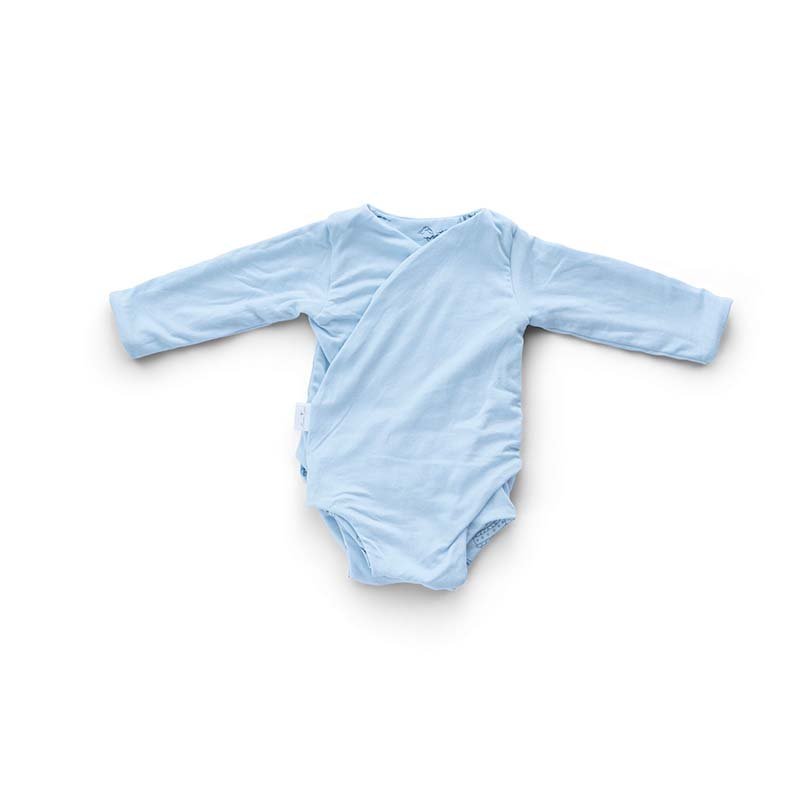 Reversible long-sleeve baby winged bodysuit in bamboo cotton.