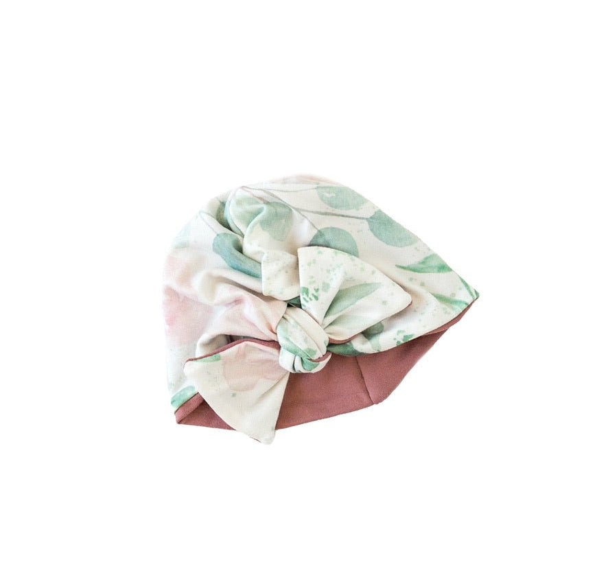 Reversible blushing eucalyptus design baby knotty beanie.