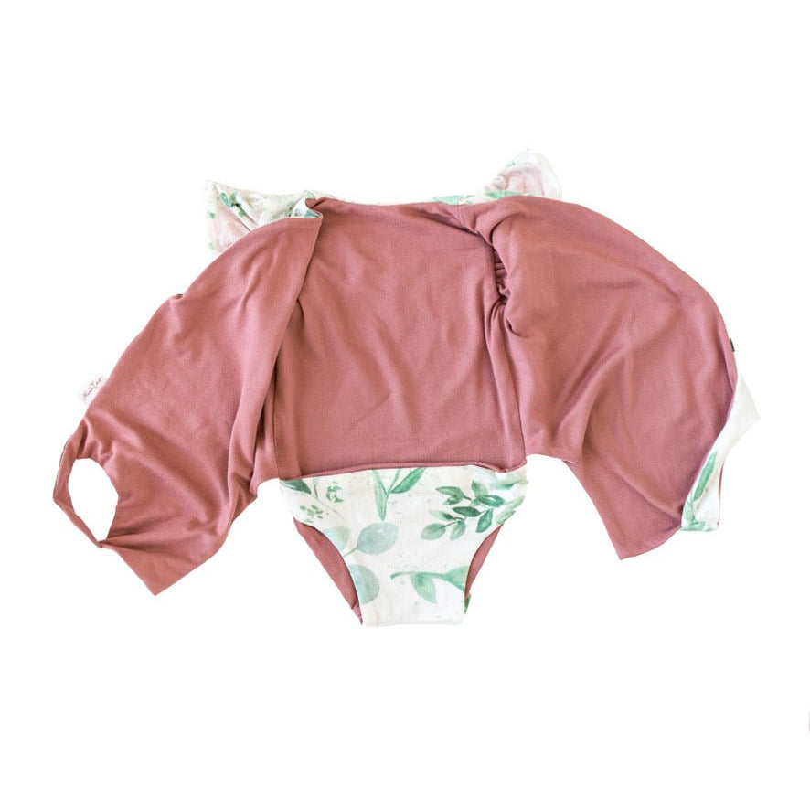 Reversible short-sleeve bodysuit for baby in Classic Brushed fabric styles featuring the Blushing Eucalyptus print.