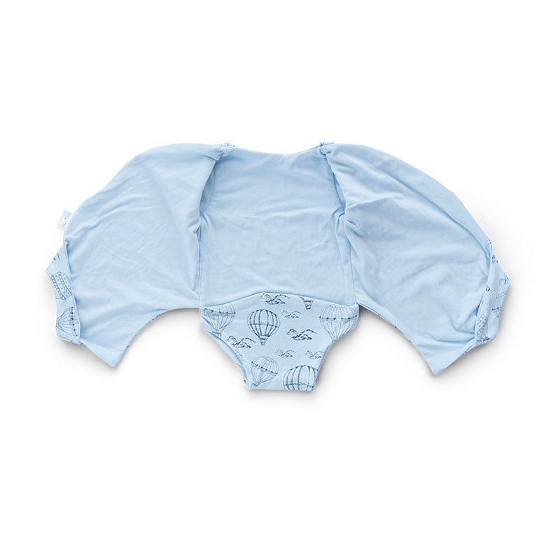 Reversible winged bodysuit for babies in bon voyage design.