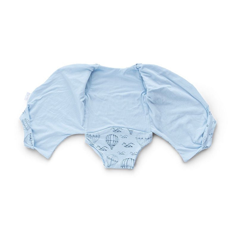 Reversible winged bodysuit for babies in bon voyage design.