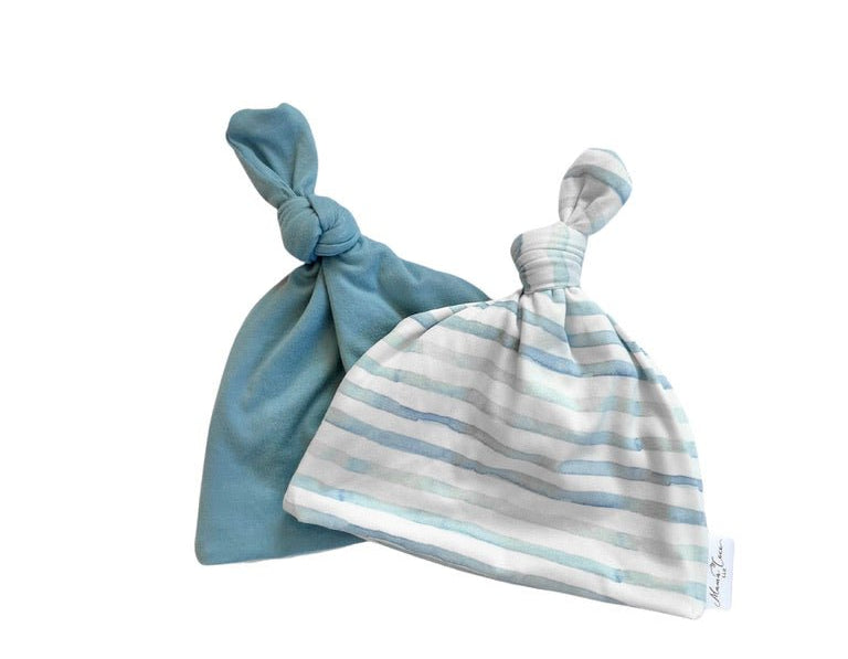 Reversible classic brushed baby beanie in chambray waves design.
