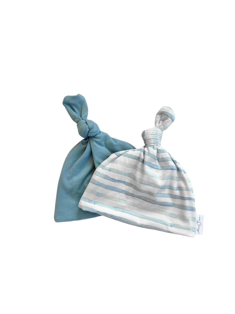 Reversible classic brushed baby beanie in chambray waves design.
