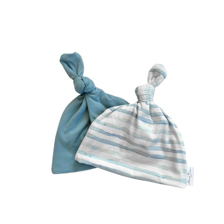 Reversible classic brushed baby beanie in chambray waves design.