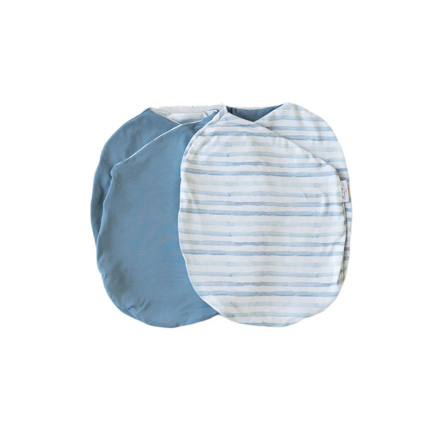 Reversible chambray waves design cocoon baby swaddle in classic brushed fabric.