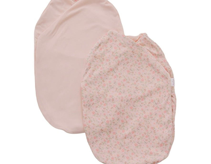 Reversible dusty roses design cocoon baby swaddle in classic brushed fabric.