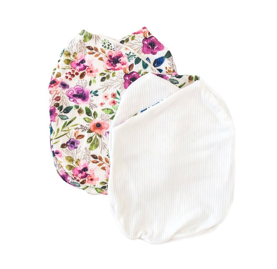 Reversible ivory wildflowers design cocoon baby swaddle in classic brushed fabric.