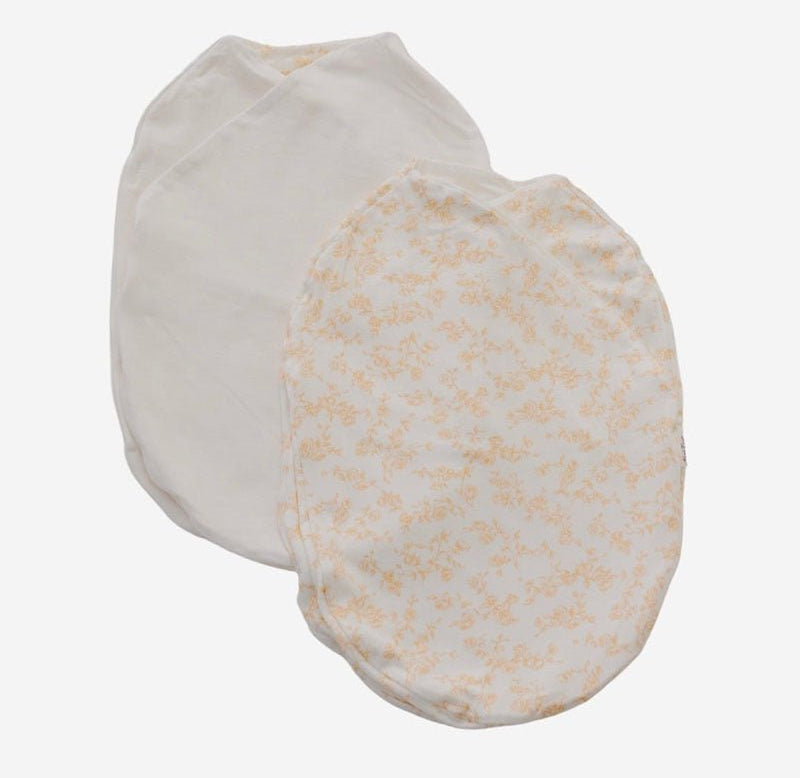 Reversible cocoon swaddle baby blanket in Silky Modal fabric styles featuring the Bitty Blooms pattern.
