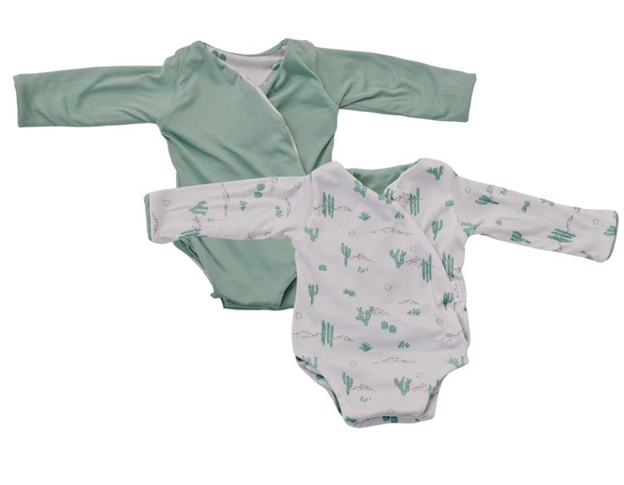 Reversible desert sunsets design long-sleeve baby onesie in classic brushed fabric.
