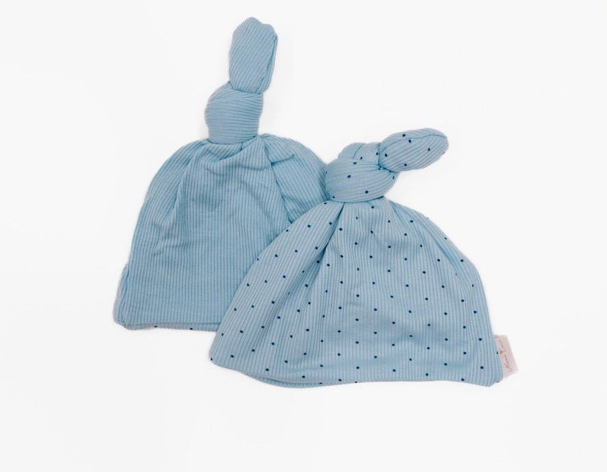 Reversible silky modal baby knotty beanie in dotted blues design.