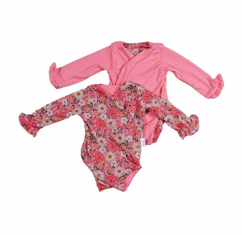 Reversible ruffle cuff baby bodysuit with wings in Flower Power design classic brushed fabric for babies.