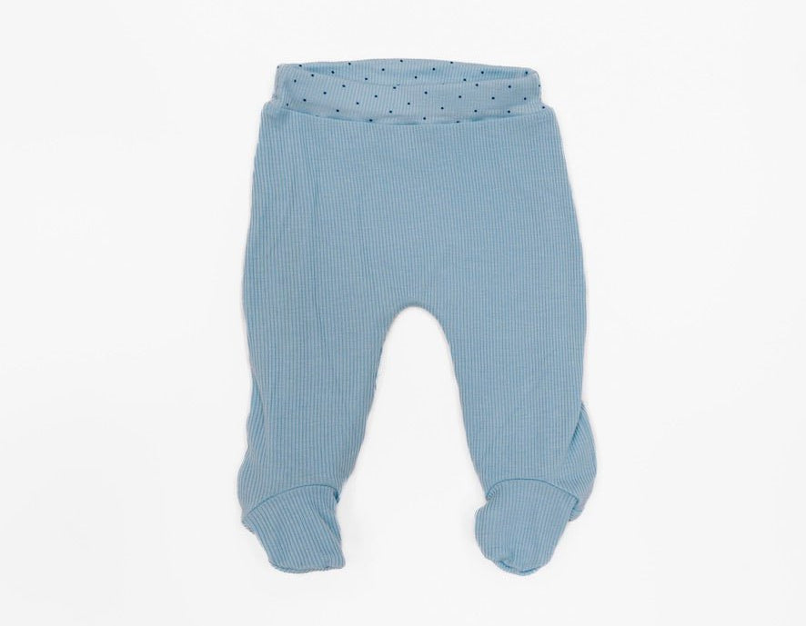 Reversible baby footie pants designed in silky modal fabric featuring our Dotted Blues design.