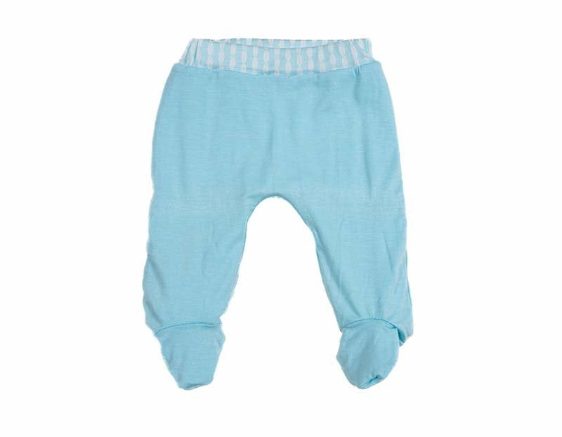 Reversible Lil Surfer print baby footie pants created from premium silky modal material.