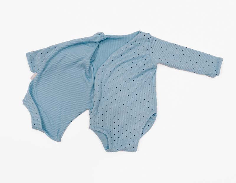 Reversible Dotted Blues design long sleeve winged bodysuit.
