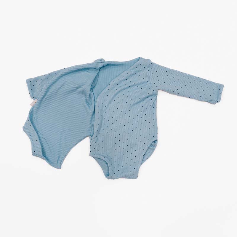 Reversible Dotted Blues design long sleeve winged bodysuit.