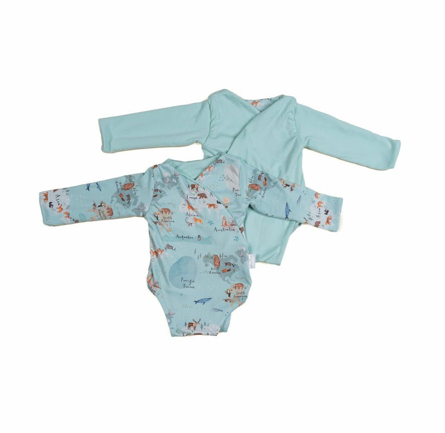 Reversible World Traveler design long sleeve winged bodysuit.