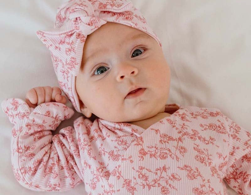 Classic brushed flutter sleeve newborn essentials bundle in bitty pink blooms design.