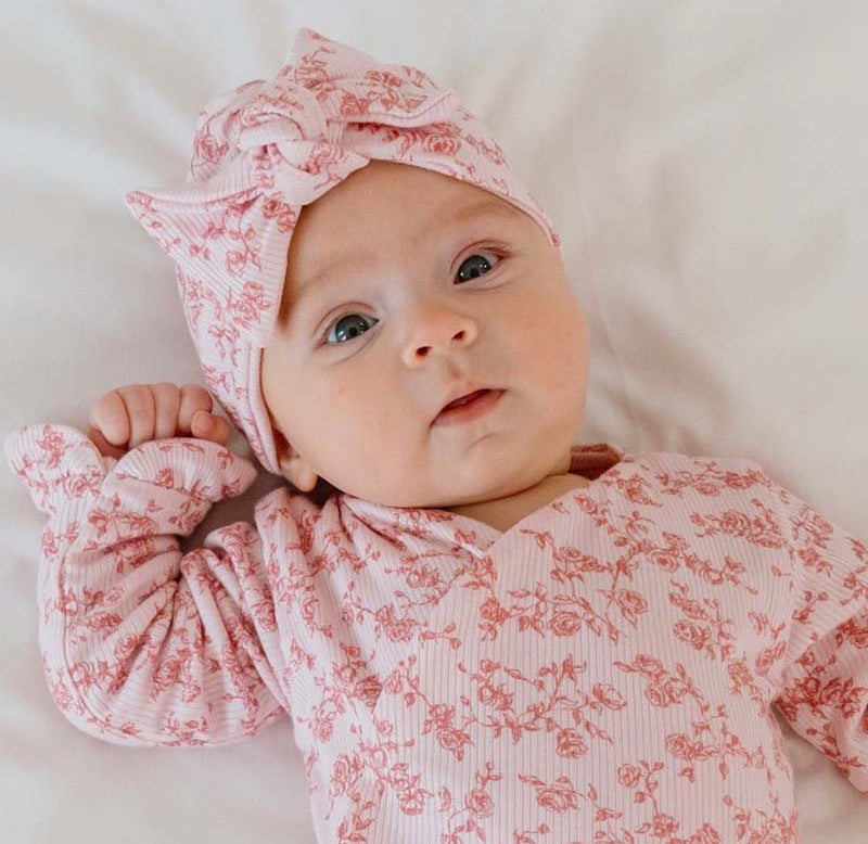 Classic brushed flutter sleeve newborn essentials bundle in bitty pink blooms design.