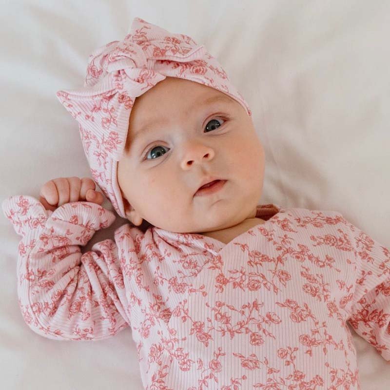 Classic brushed flutter sleeve newborn essentials bundle in bitty pink blooms design.