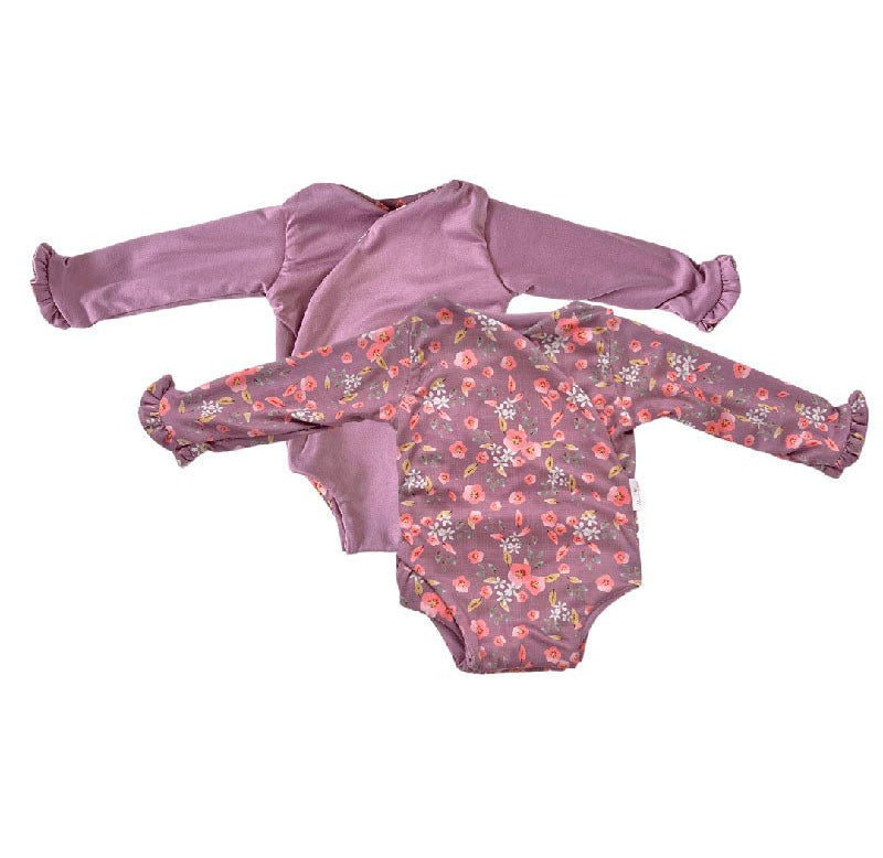 Reversible ruffle cuff baby bodysuit with wings in Peachy Lilac design classic brushed fabric for babies.