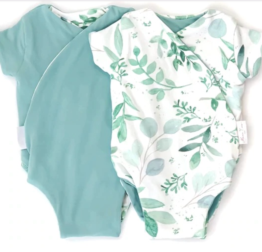 Reversible saged eucalyptus design short-sleeve baby onesie in classic brushed fabric.