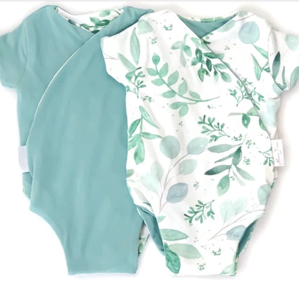 Reversible saged eucalyptus design short-sleeve baby onesie in classic brushed fabric.