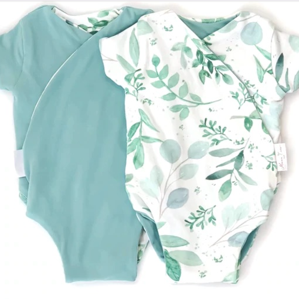Reversible saged eucalyptus design short-sleeve baby onesie in classic brushed fabric.