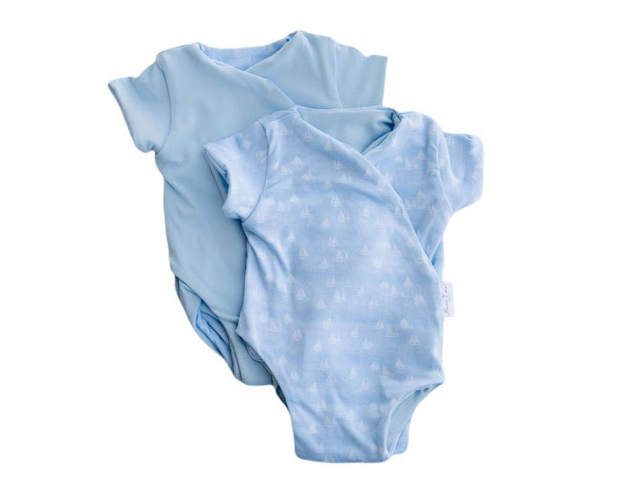 Reversible sailboat shores design short-sleeve baby onesie in classic brushed fabric.