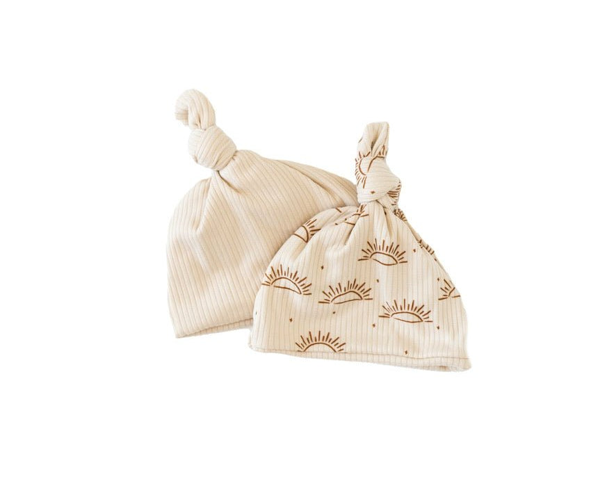 Reversible classic brushed baby beanie in sandy sunsets design.