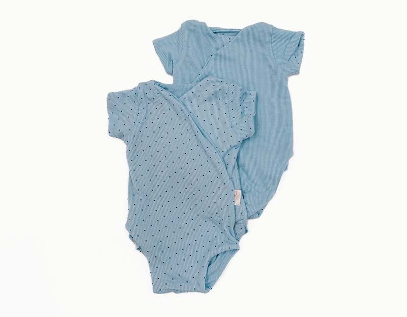 Reversible Dotted Blues design short sleeve winged bodysuit.