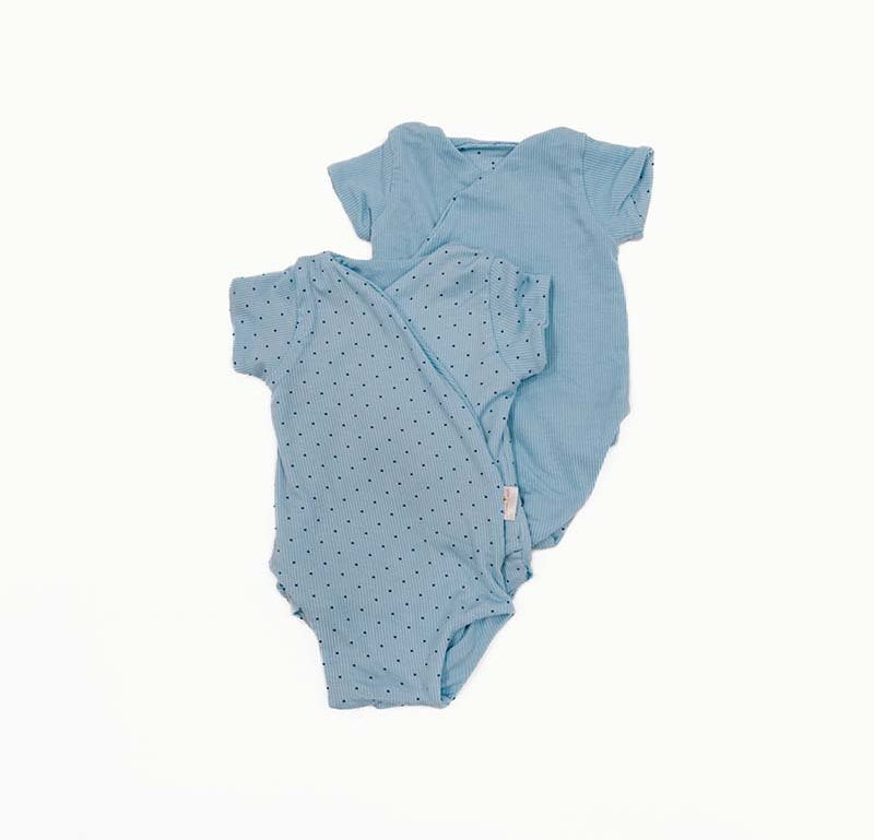 Reversible Dotted Blues design short-sleeved winged bodysuit.