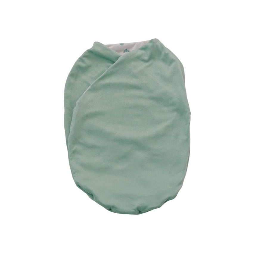 Reversible premium baby cocoon swaddle crafted from Desert Sunsets print Silky Modal fabric.