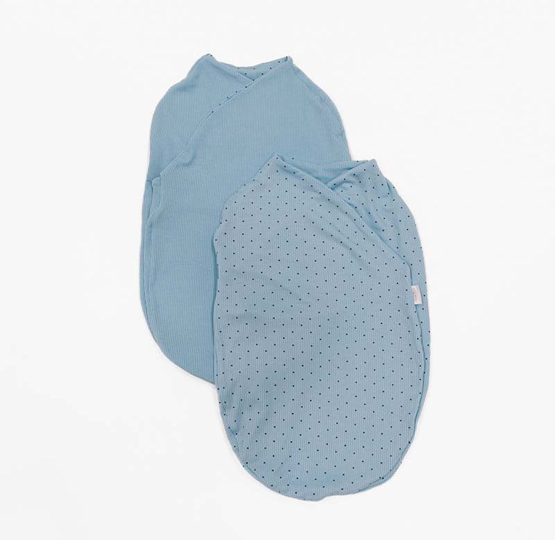 Reversible Soft Dotted Blues design on a Cocoon swaddle baby blanket in Silky Modal fabric styles.