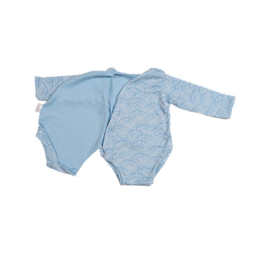 Long sleeved winged bodysuit for babies in classic brushed fabric.