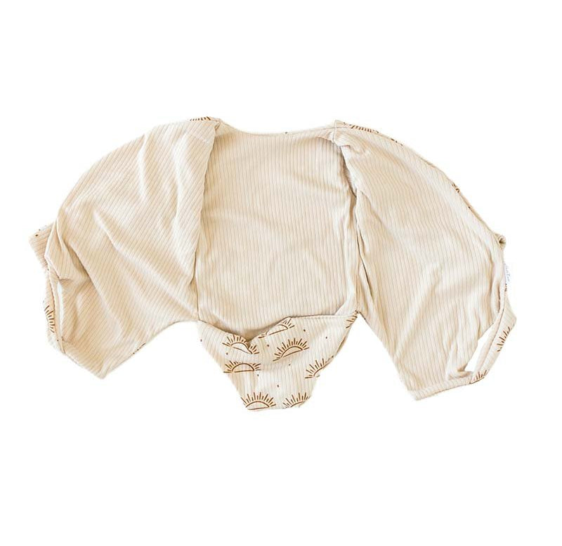 Reversible long sleeved winged bodysuit for babies in classic brushed fabric.