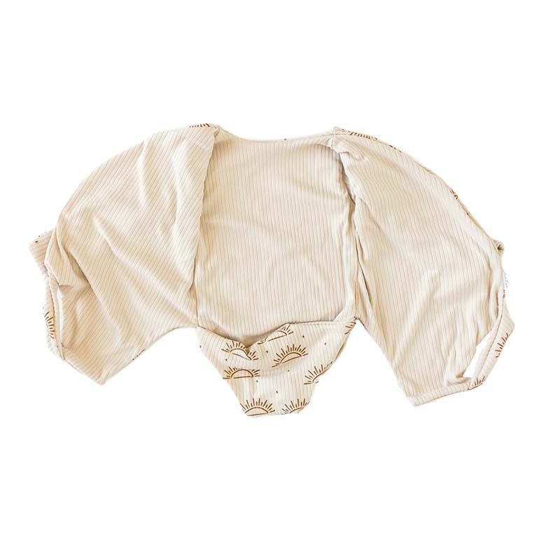 Reversible long sleeved winged bodysuit for babies in classic brushed fabric.
