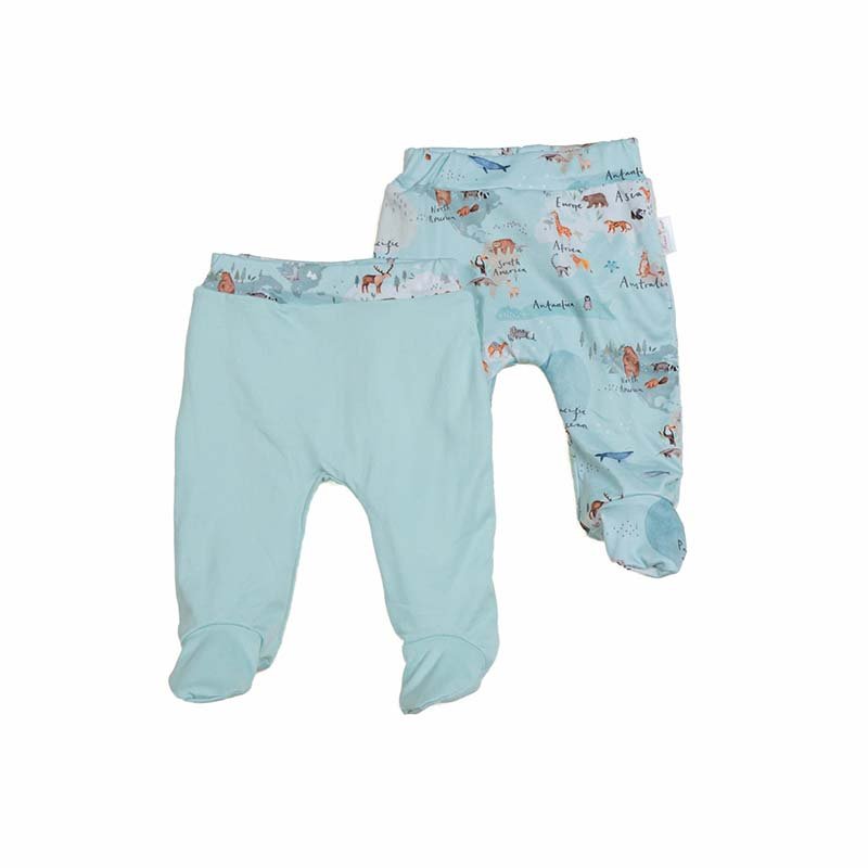 Reversible baby footie pants crafted from a soft bamboo cotton fabric featuring the World Traveler print.
