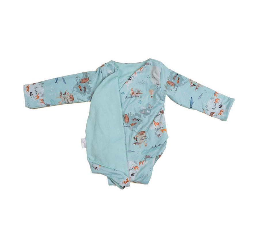 Reversible world traveler design long-sleeve baby onesie in classic brushed fabric.