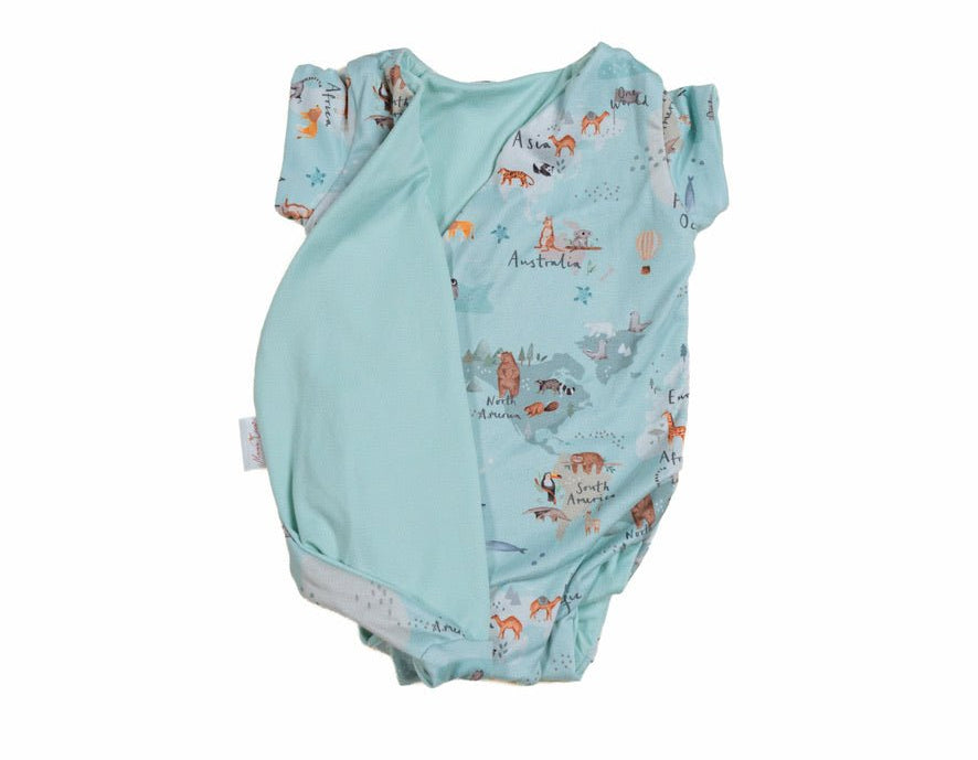 Reversible world traveler design short-sleeve baby onesie in classic brushed fabric.
