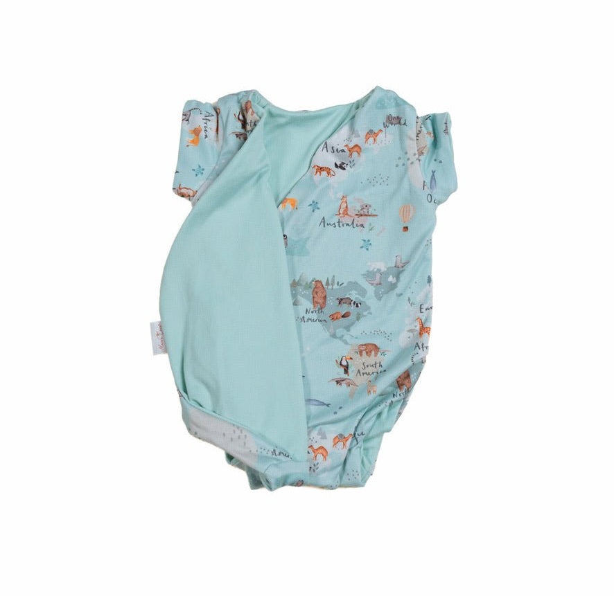 Reversible world traveler design short-sleeve baby onesie in classic brushed fabric.