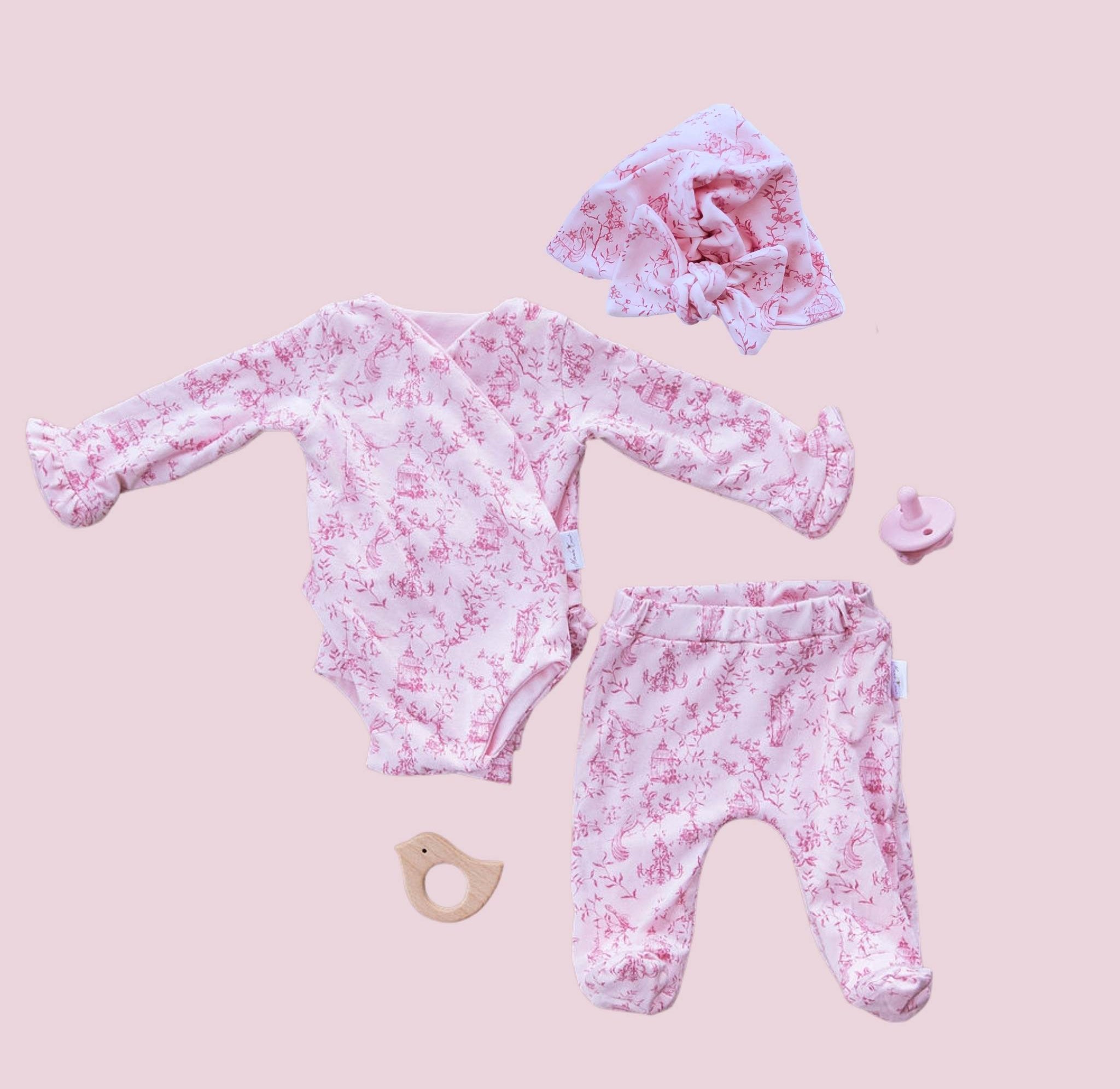 Long-sleeve ruffle cuff baby onesie outfit bundle made from bamboo cotton in whimsical garden design.