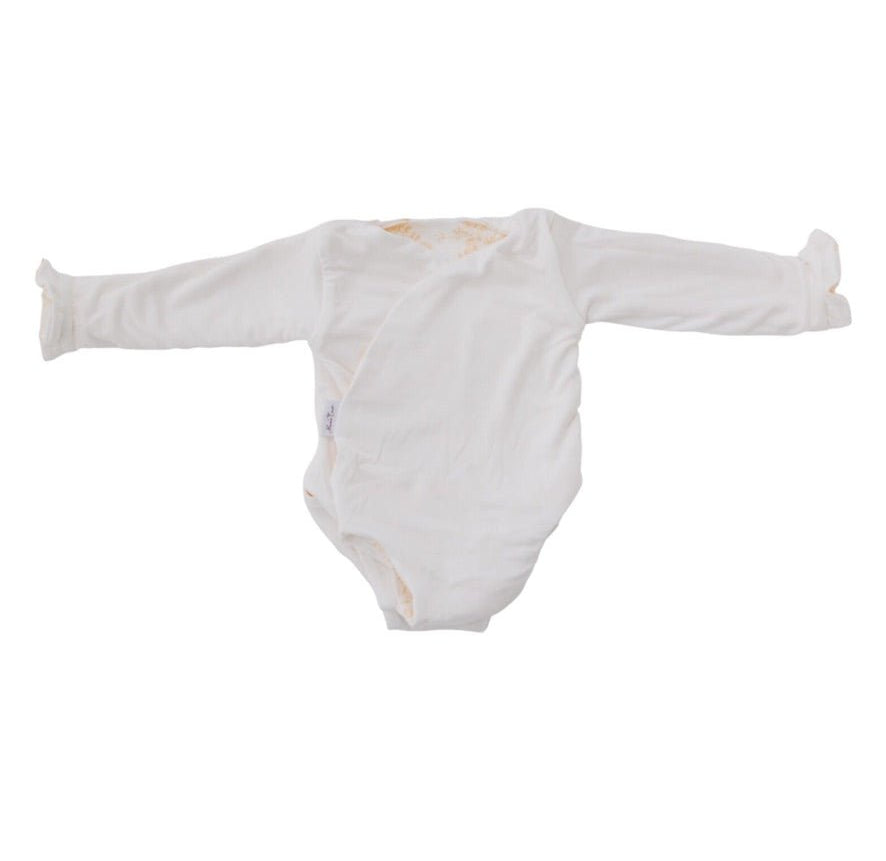 Reversible ruffle cuff baby winged bodysuit in Bitty Blooms design.