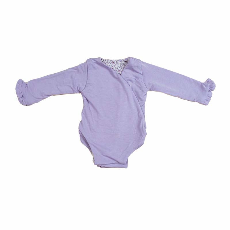 Reversible Purple Posies design ruffle cuff long sleeved winged bodysuit in silky modal fabric.