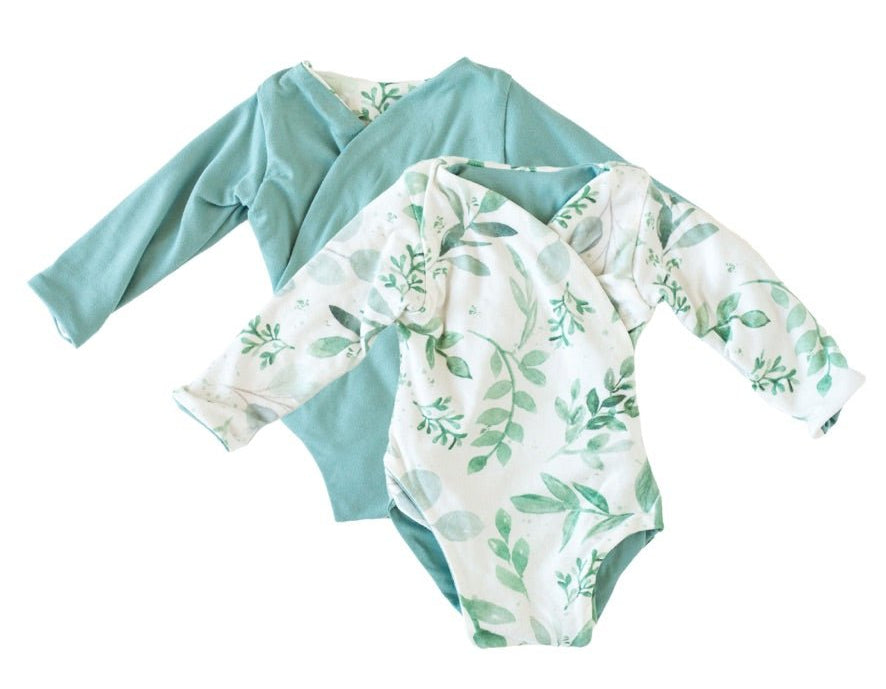 Saged eucalyptus design long-sleeve baby onesie in classic brushed fabric.