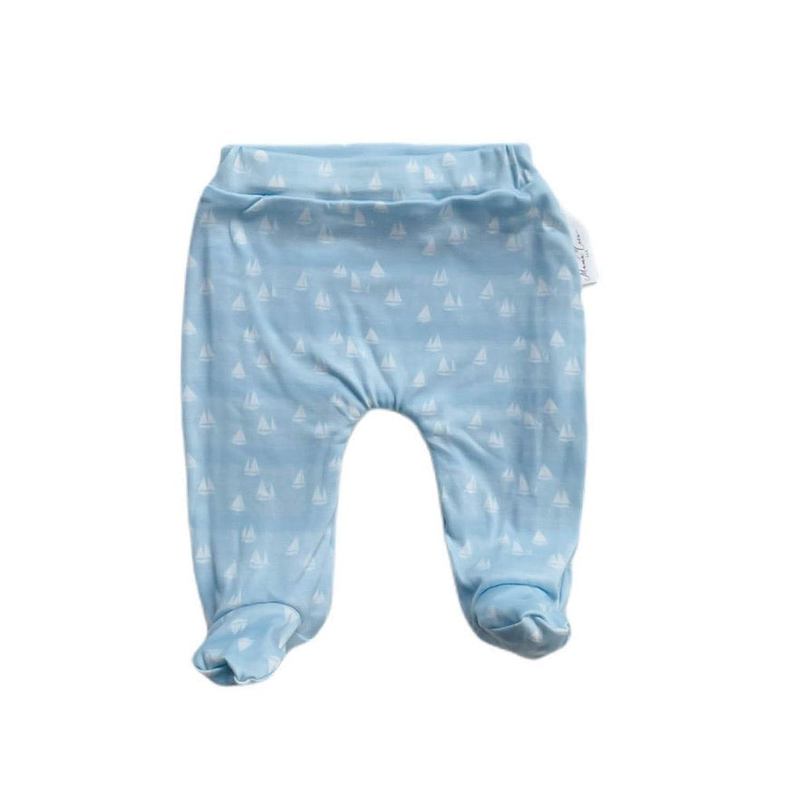 Baby footie pants crafted from a soft bamboo cotton fabric featuring the Sailboat Shores print.