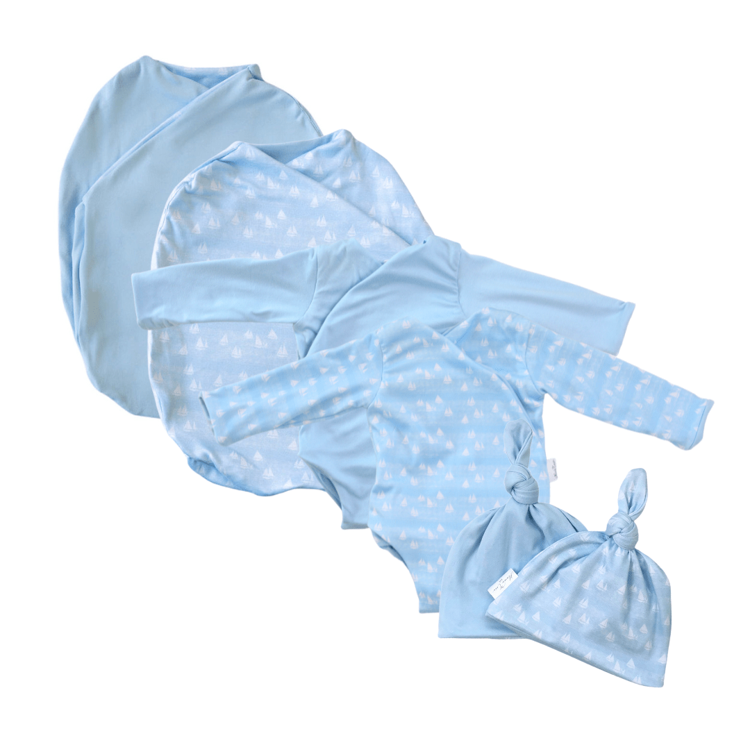 Newborn bundle with long sleeve essentials in classic brushed fabric with sailboat shores design.