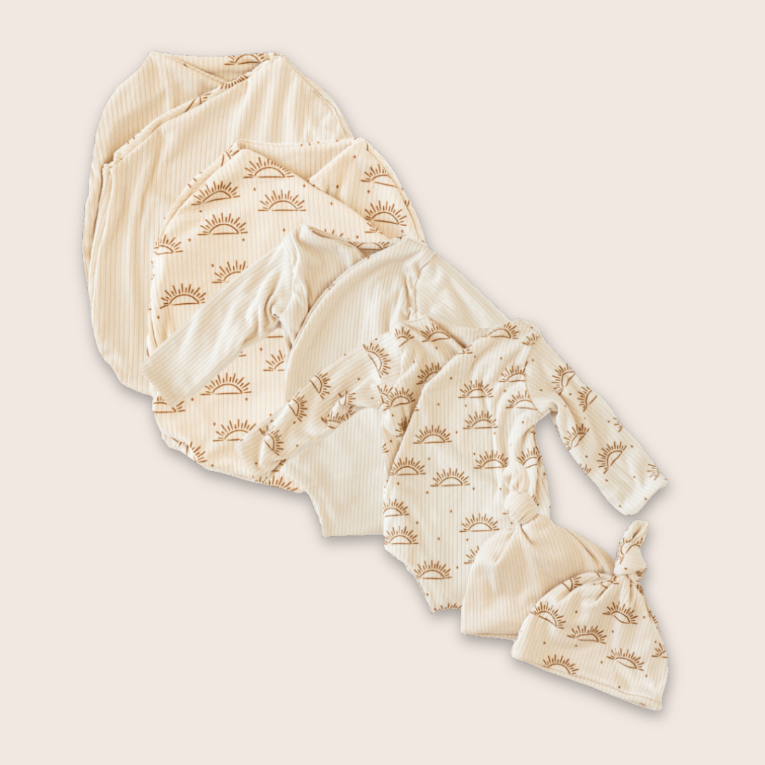 Newborn bundle with long sleeve essentials in classic brushed fabric with sandy sunsets design.