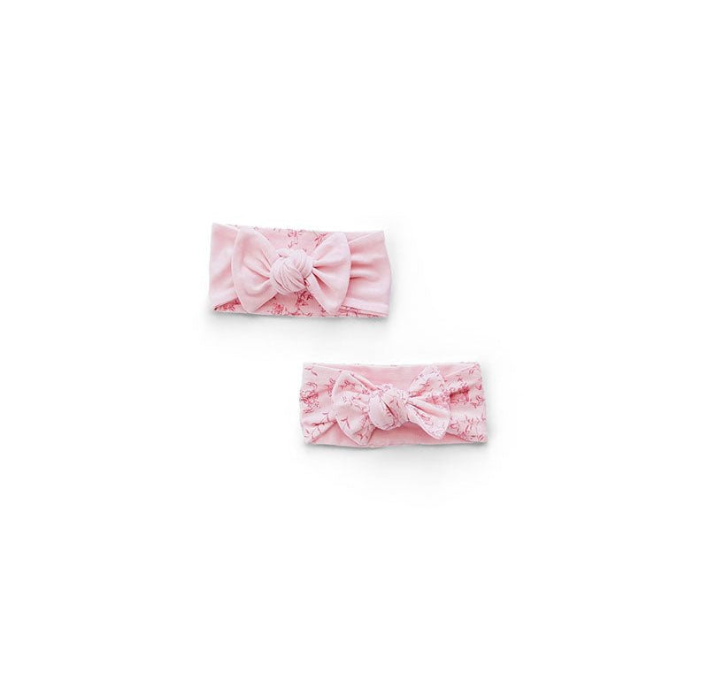 Baby headwraps in whimsical garden design, finished with a matching bow and crafted from bamboo and organic cotton fabric.