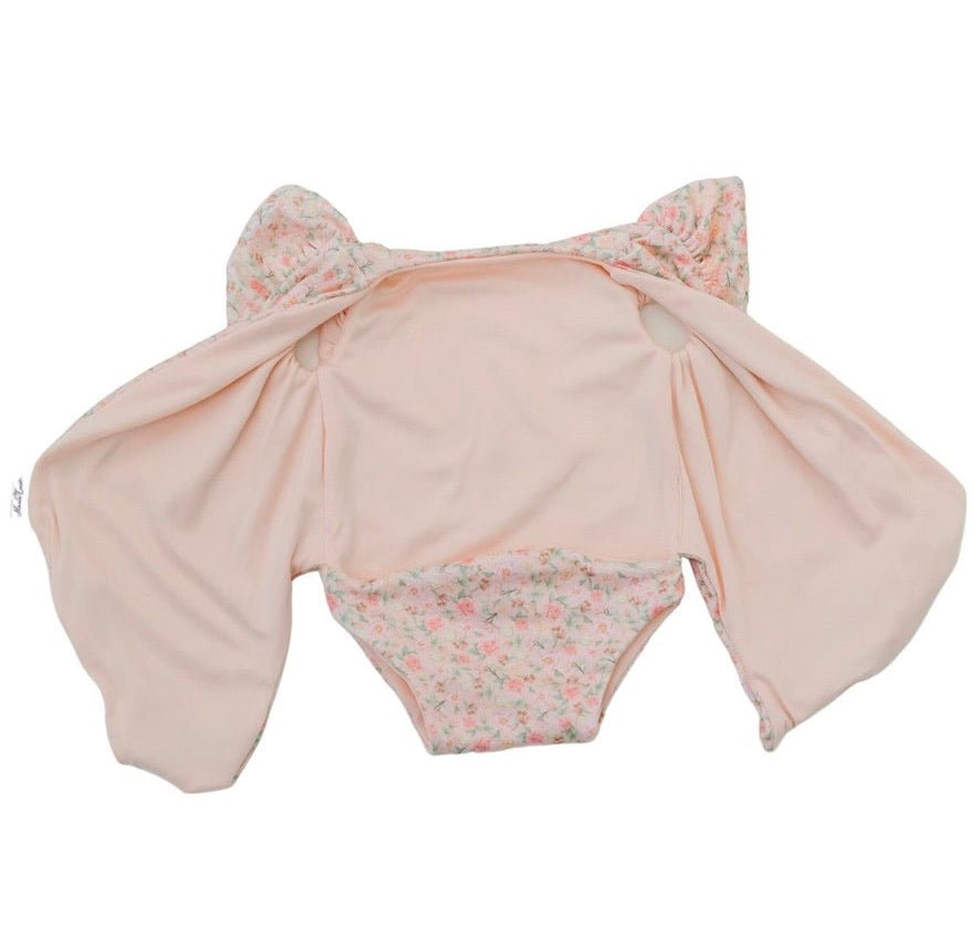 Reversible short-sleeve bodysuit for baby showcasing Dusty Roses in premium brushed fabric.