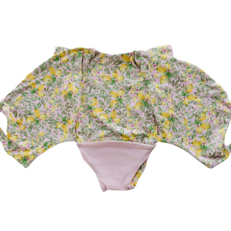 Pink Lemonade short-sleeve bodysuit for baby in Classic Brushed fabric styles with a cheerful floral print.